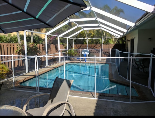 10420 SW 160th Ct, Miami, FL 33196 - view of pool featuring a lanai, a patio, a fenced backyard, and a fenced in pool