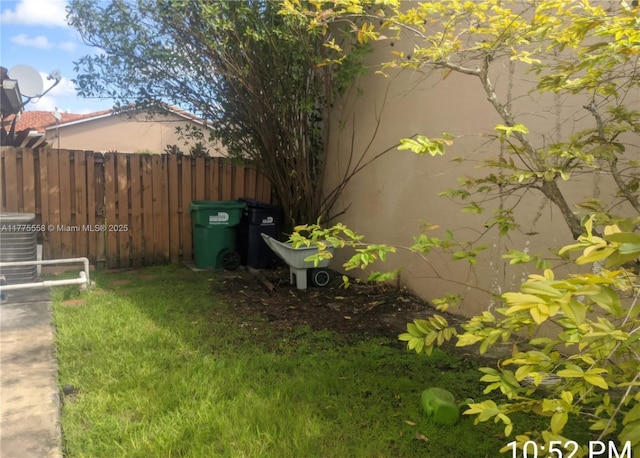 10420 SW 160th Ct, Miami, FL 33196 - view of yard with central air condition unit and fence