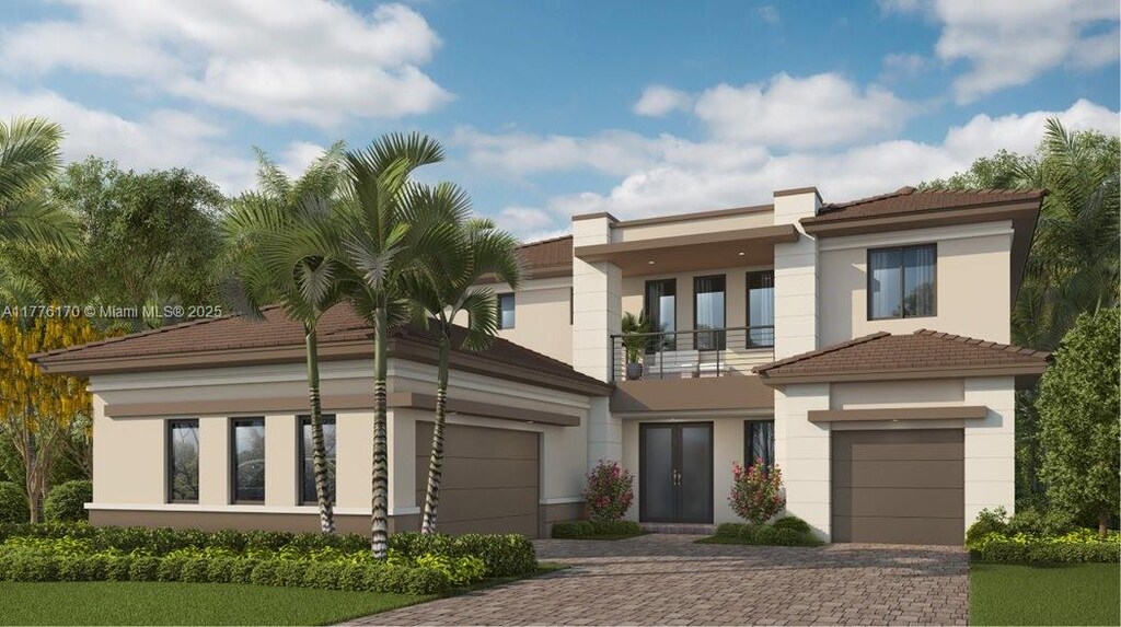 view of front of house featuring a garage, driveway, a balcony, and stucco siding