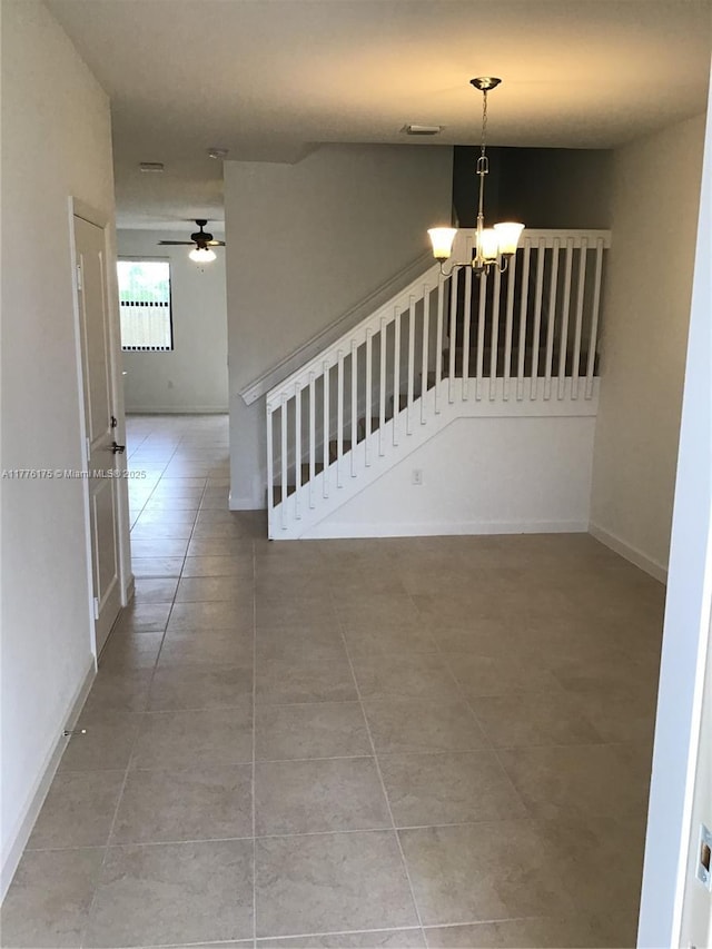 11378 SW 254th Ter, Homestead, FL 33032 - interior space featuring ceiling fan with notable chandelier, baseboards, and visible vents