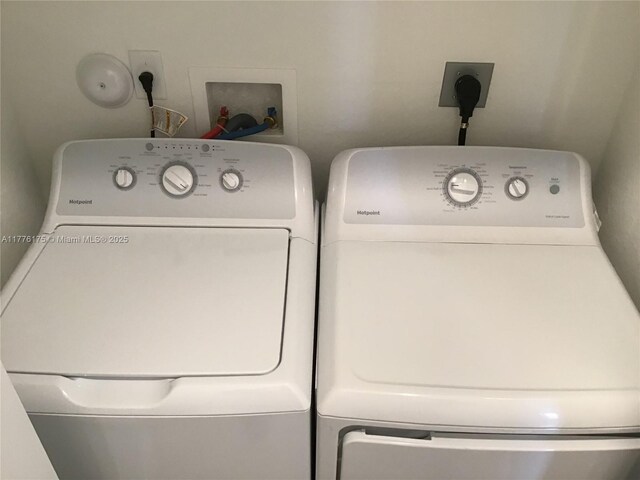 11378 SW 254th Ter, Homestead, FL 33032 - clothes washing area featuring washing machine and clothes dryer and laundry area