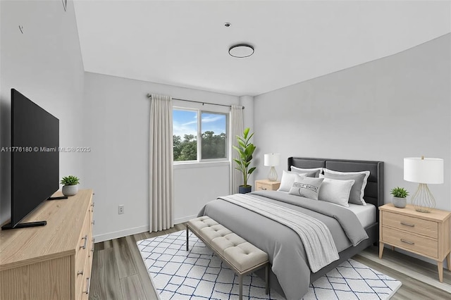 2280 SW 32nd Ave Unit 305, Miami, FL 33145 - bedroom featuring light wood-style flooring and baseboards