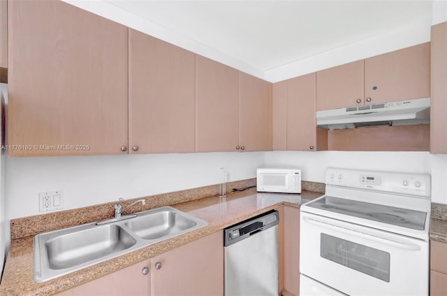 2280 SW 32nd Ave Unit 305, Miami, FL 33145 - kitchen with white appliances, under cabinet range hood, a sink, and light countertops
