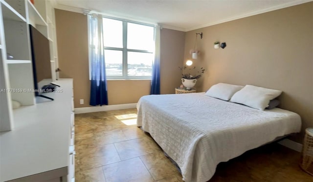 bedroom with light tile patterned flooring, baseboards, and ornamental molding