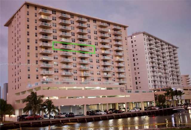 view of building exterior with a water view