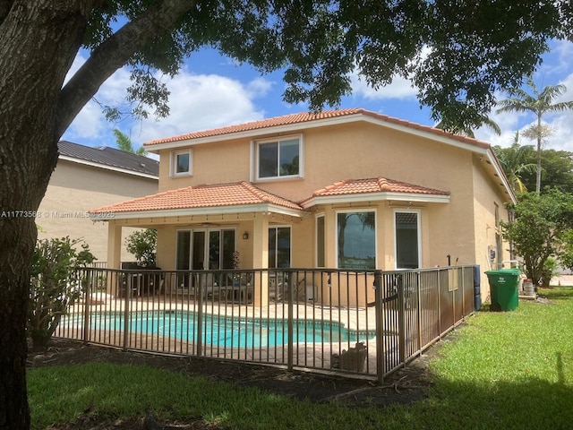 17794 SW 47th St, Miramar, FL 33029 - rear view of property featuring stucco siding, a tile roof, and a patio area