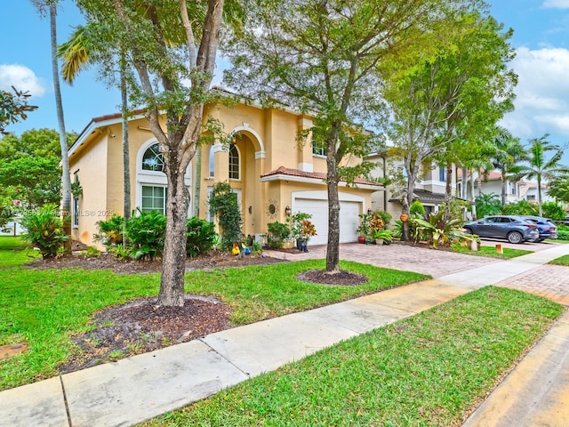 17794 SW 47th St, Miramar, FL 33029 - view of front facade with stucco siding, driveway, a front lawn, and a garage