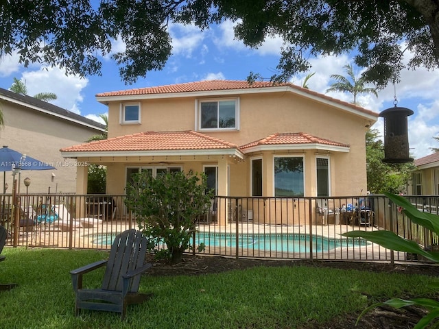 17794 SW 47th St, Miramar, FL 33029 - back of property featuring a tiled roof, stucco siding, and a patio area