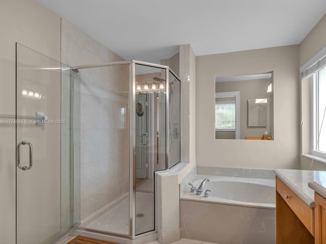 17794 SW 47th St, Miramar, FL 33029 - bathroom featuring vanity, healthy amount of natural light, a bath, and a shower stall