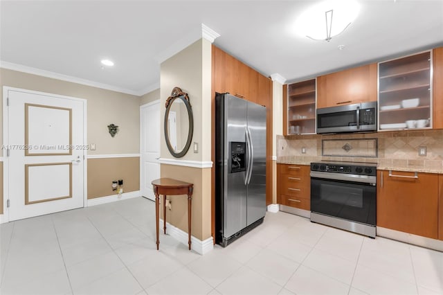 1945 S Ocean Dr Unit 604, Hallandale Beach, FL 33009 - kitchen with stainless steel appliances, open shelves, brown cabinetry, backsplash, and crown molding