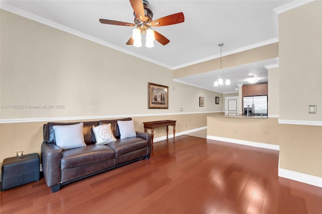 1945 S Ocean Dr Unit 604, Hallandale Beach, FL 33009 - living area with dark wood-type flooring, ceiling fan, ornamental molding, and a chandelier