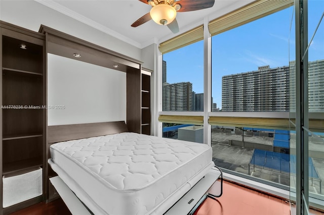 1945 S Ocean Dr Unit 604, Hallandale Beach, FL 33009 - bedroom with crown molding, a view of city, and a ceiling fan