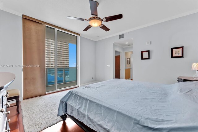 1945 S Ocean Dr Unit 604, Hallandale Beach, FL 33009 - carpeted bedroom featuring access to outside, ornamental molding, and a ceiling fan