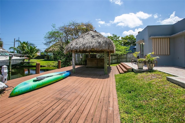 4750 SW 43rd Ave, Dania Beach, FL 33314 - deck featuring a gazebo, a lawn, and fence