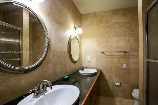 4750 SW 43rd Ave, Dania Beach, FL 33314 - full bath featuring toilet, tasteful backsplash, a sink, and tile walls