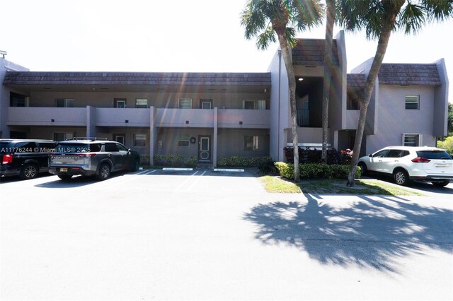 2700 Casita Way Unit 2150, Delray Beach, FL 33445 - view of property featuring uncovered parking