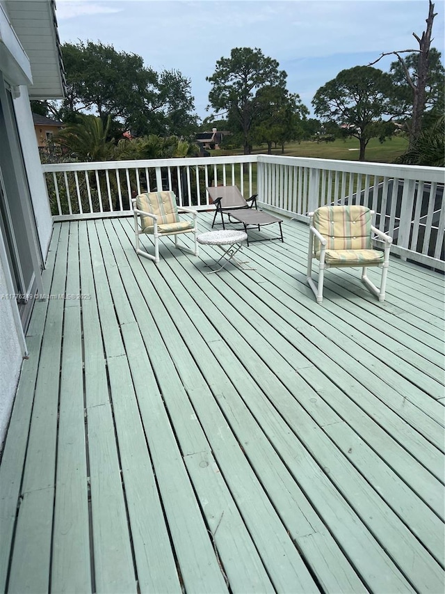 721 Spring Lake Dr, Melbourne, FL 32940 - view of wooden deck