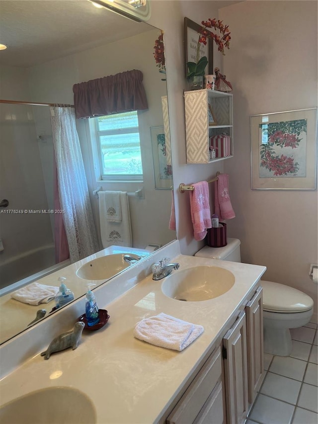 721 Spring Lake Dr, Melbourne, FL 32940 - full bath featuring toilet, tile patterned floors, a shower with shower curtain, and a sink
