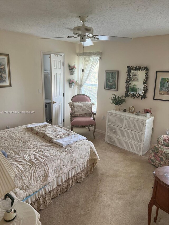 721 Spring Lake Dr, Melbourne, FL 32940 - bedroom with ceiling fan, a textured ceiling, and carpet floors