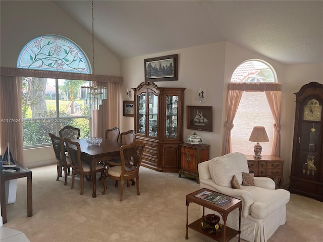 721 Spring Lake Dr, Melbourne, FL 32940 - dining area featuring high vaulted ceiling, plenty of natural light, and light carpet