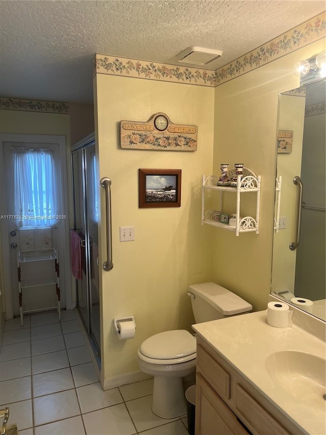 721 Spring Lake Dr, Melbourne, FL 32940 - full bath with vanity, tile patterned flooring, a textured ceiling, toilet, and a shower stall