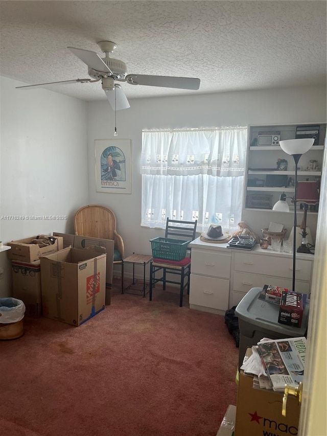 721 Spring Lake Dr, Melbourne, FL 32940 - bedroom with a ceiling fan, carpet, and a textured ceiling