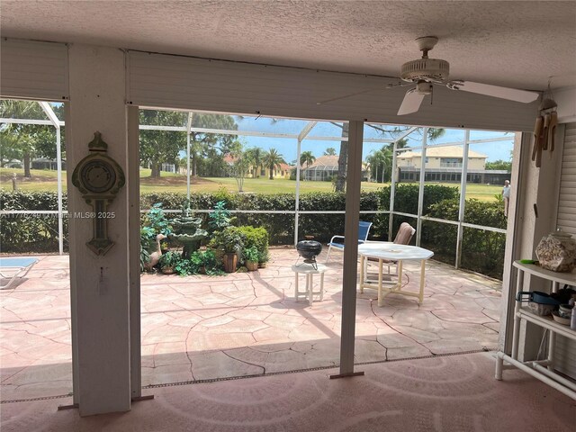 721 Spring Lake Dr, Melbourne, FL 32940 - exterior space with a healthy amount of sunlight, a textured ceiling, and ceiling fan
