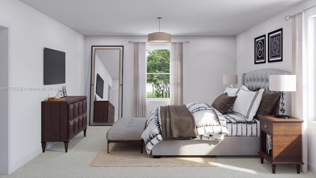 carpeted bedroom with baseboards