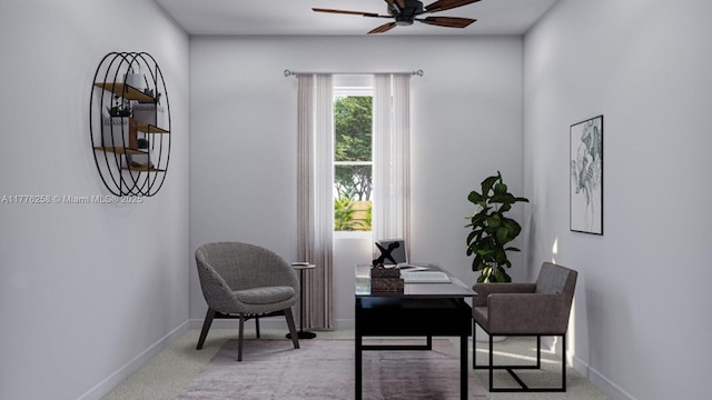 office area with baseboards, carpet, and a ceiling fan
