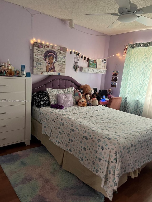 2912 NW 80th Ave, Sunrise, FL 33322 - bedroom featuring wood finished floors, a textured ceiling, and ceiling fan