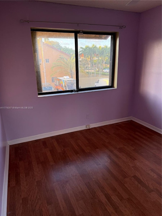 2912 NW 80th Ave, Sunrise, FL 33322 - empty room featuring wood finished floors and baseboards