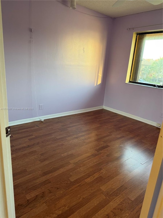 2912 NW 80th Ave, Sunrise, FL 33322 - empty room featuring baseboards and wood finished floors