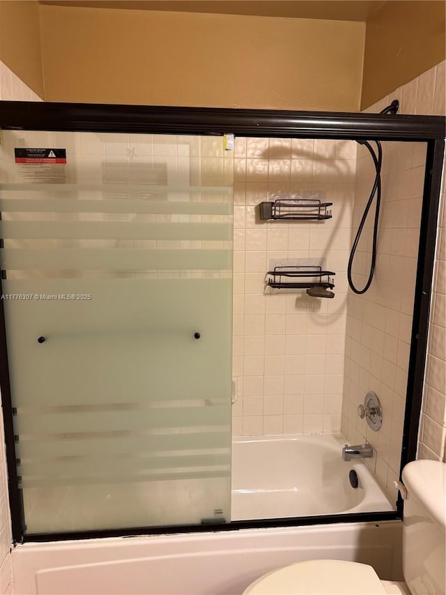 2912 NW 80th Ave, Sunrise, FL 33322 - bathroom with toilet and shower / bath combination with glass door