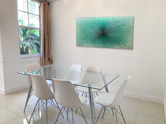 19501 E Country Club Dr Unit 9102, Aventura, FL 33180 - dining area with light tile patterned floors and baseboards
