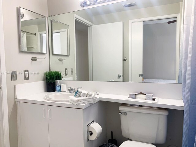 19501 E Country Club Dr Unit 9102, Aventura, FL 33180 - bathroom featuring visible vents, toilet, and vanity