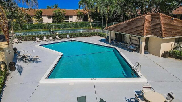 6342 W Longboat Ln W Unit C201, Boca Raton, FL 33433 - community pool featuring a patio area
