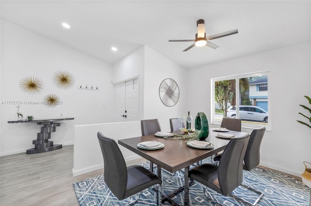 dining space with vaulted ceiling, a ceiling fan, light wood-style flooring, baseboards, and recessed lighting