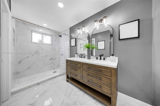 full bathroom with a marble finish shower, marble finish floor, a sink, and double vanity