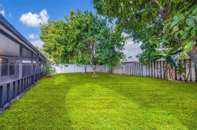 view of yard featuring a fenced backyard