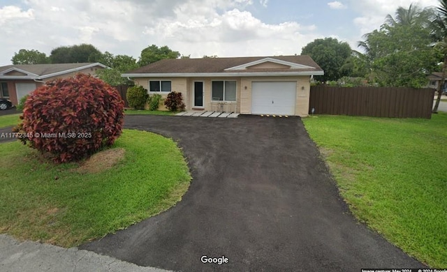 3190 NW 66th Dr, Fort Lauderdale, FL 33309 - ranch-style home featuring a garage and driveway