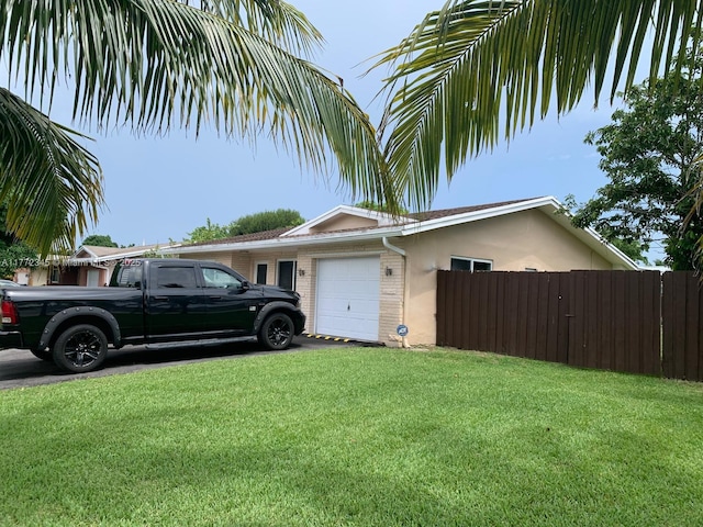 3190 NW 66th Dr, Fort Lauderdale, FL 33309 - view of property exterior featuring a garage, brick siding, and stucco siding