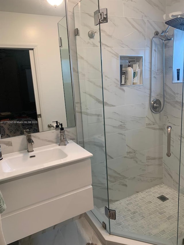 3190 NW 66th Dr, Fort Lauderdale, FL 33309 - bathroom with a stall shower, marble look tile flooring, and vanity