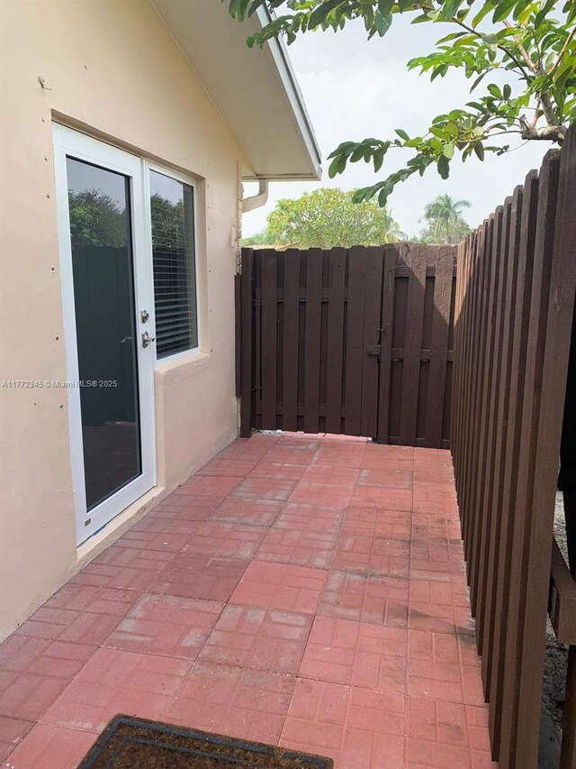 3190 NW 66th Dr, Fort Lauderdale, FL 33309 - view of patio featuring fence