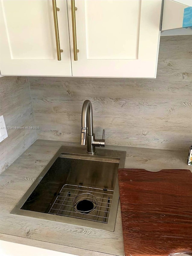 3190 NW 66th Dr, Fort Lauderdale, FL 33309 - kitchen view of a sink and white cabinetry