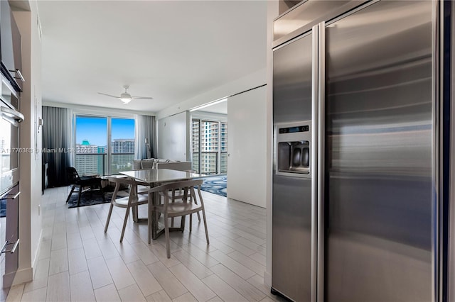 3101 Bayshore Dr Unit 603, Fort Lauderdale, FL 33304 - dining space featuring a ceiling fan and wood tiled floor