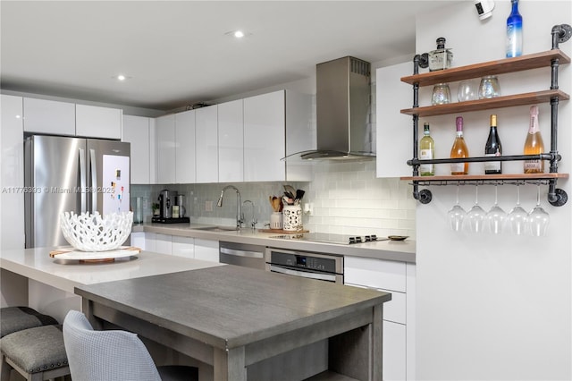 1600 NE 1st Ave Unit 2615, Miami, FL 33132 - kitchen featuring wall chimney exhaust hood, a sink, stainless steel appliances, open shelves, and tasteful backsplash