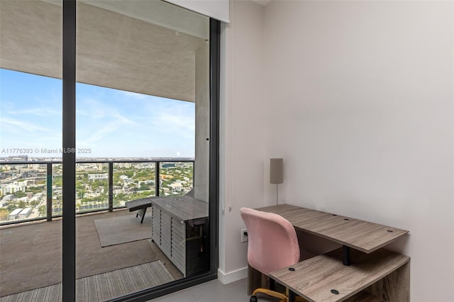 1600 NE 1st Ave Unit 2615, Miami, FL 33132 - office with a wall of windows and baseboards