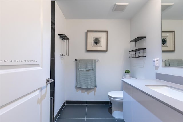 1600 NE 1st Ave Unit 2615, Miami, FL 33132 - bathroom with toilet, vanity, tile patterned flooring, and baseboards