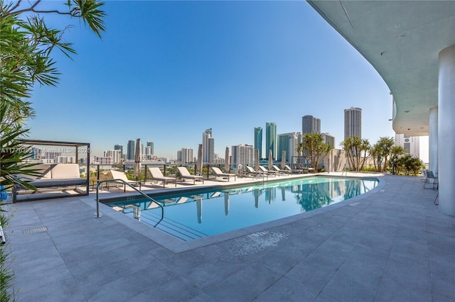 1600 NE 1st Ave Unit 2615, Miami, FL 33132 - community pool featuring a view of skyline and a patio area