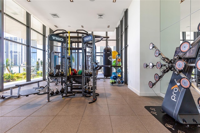 1600 NE 1st Ave Unit 2615, Miami, FL 33132 - workout area featuring floor to ceiling windows and baseboards